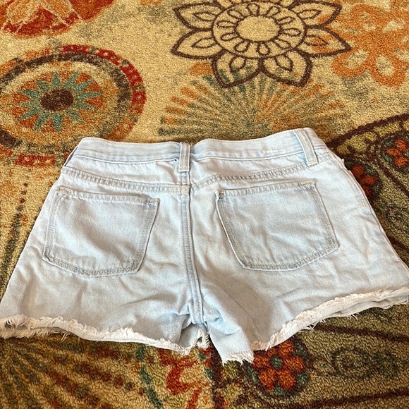 Old Navy Blue denim jean shorts. Daisy embroidery - Picture 2 of 3